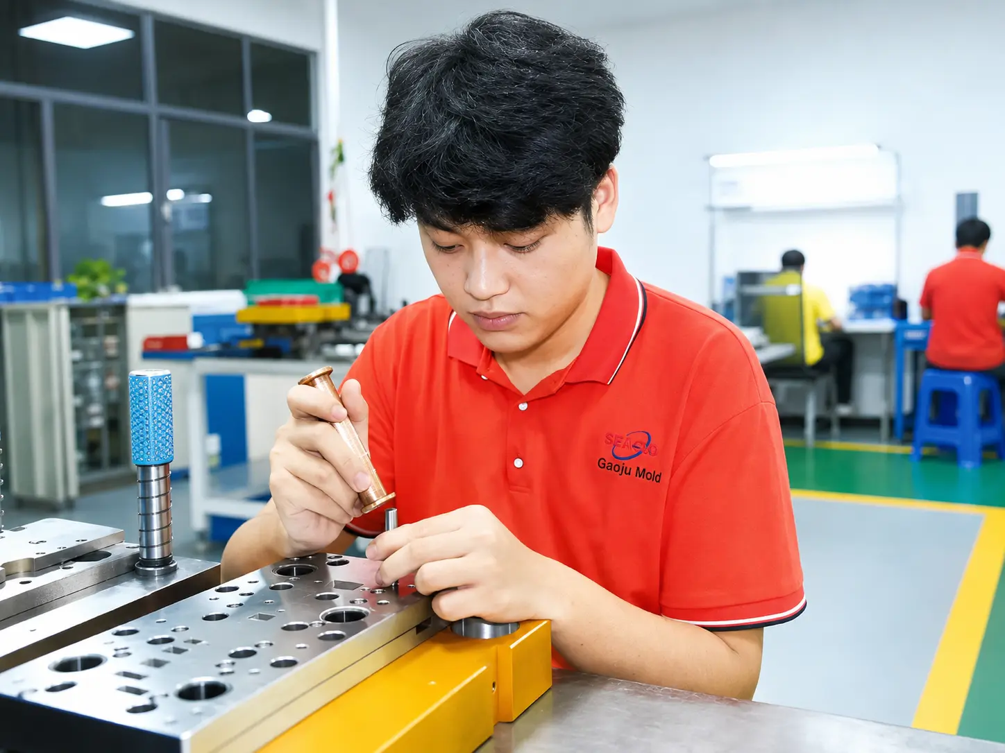 Engineer working on connector tooling